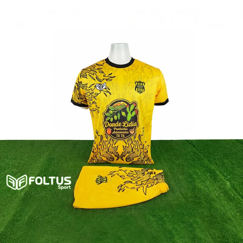uniforme personalizado amarillo sublimado hecho por Foltus Sport